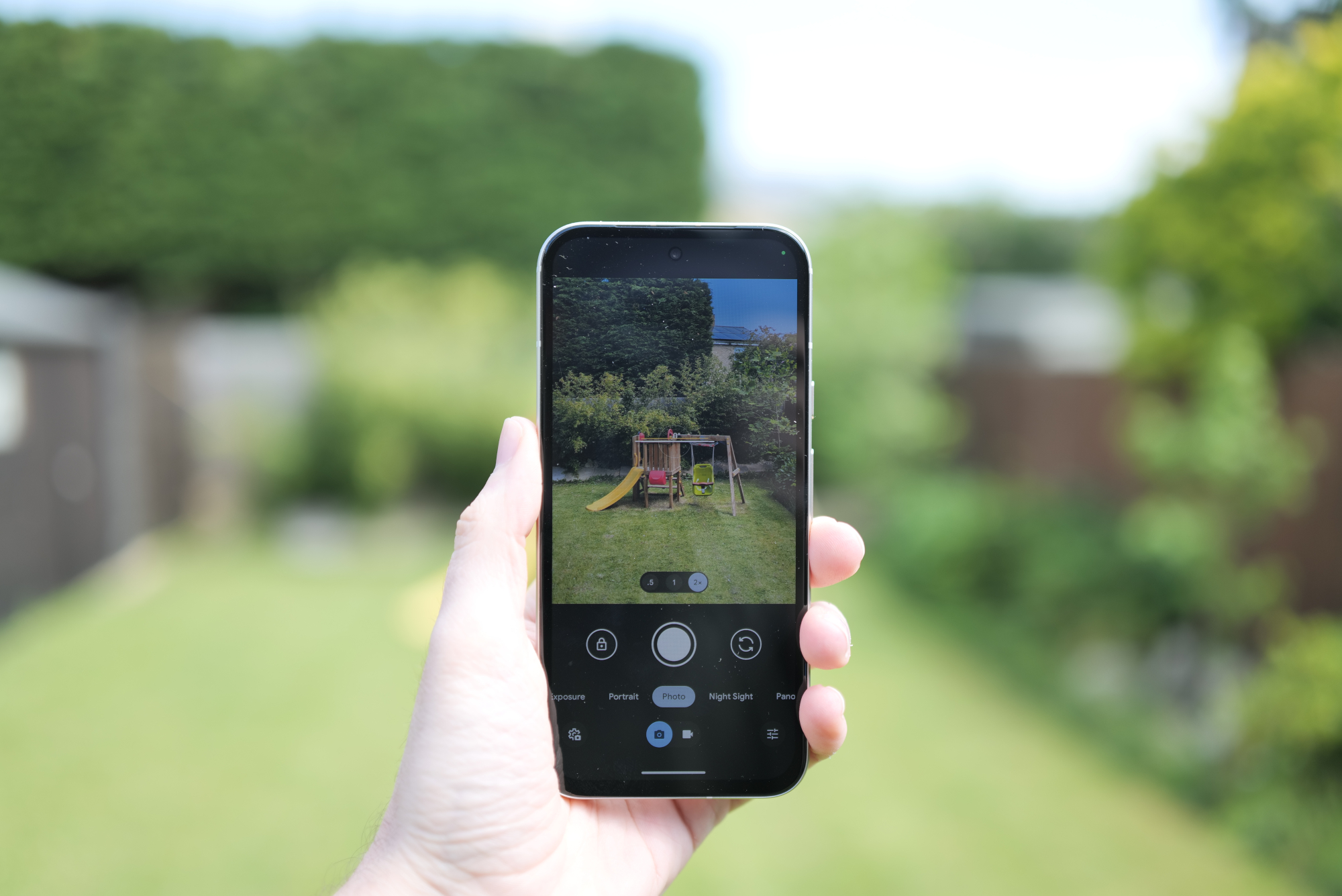 Google Pixel 8a review image showing phone in hand